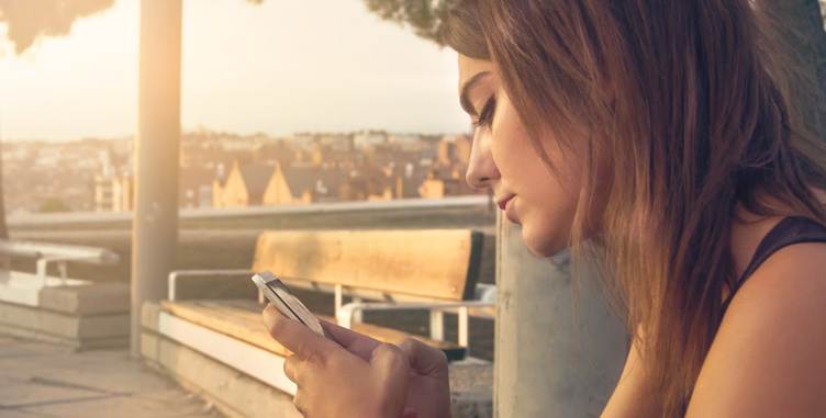 A person looking at her phone

AI-generated content may be incorrect.
