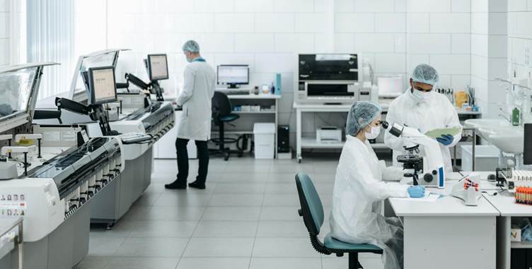 People in white coats in a laboratory

AI-generated content may be incorrect.