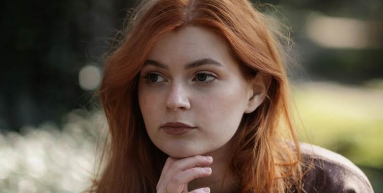 A person with red hair

AI-generated content may be incorrect.